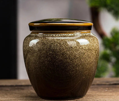 Urnes Céramique Le Sanctuaire Royal	Dignité et présence majestueuse.